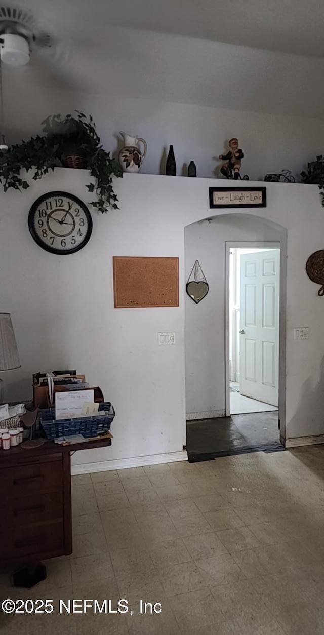 entryway featuring tile patterned floors and baseboards