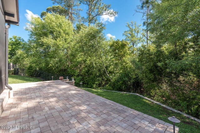 view of patio with fence