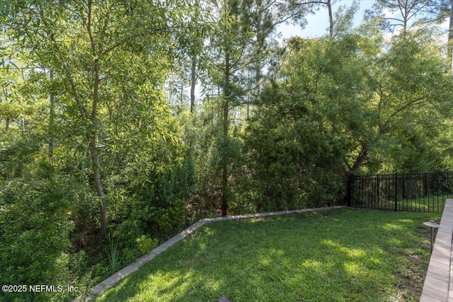 view of yard featuring fence