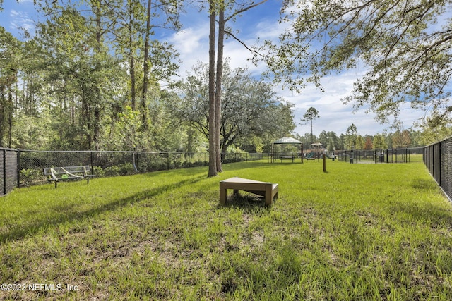 view of yard with fence
