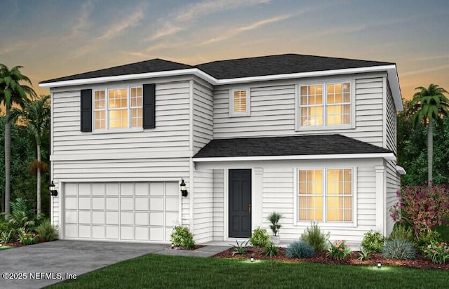 traditional-style home featuring an attached garage, driveway, and roof with shingles