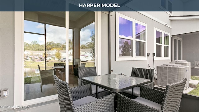 419 Seaport Breeze Rd, Saint Augustine, FL 32095 - sunroom featuring outdoor dining area