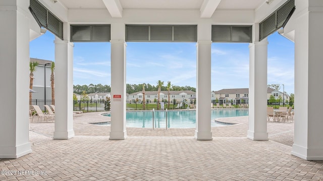 419 Seaport Breeze Rd, Saint Augustine, FL 32095 - pool with a patio, fence, and a residential view