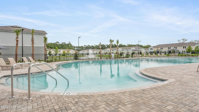 419 Seaport Breeze Rd, Saint Augustine, FL 32095 - community pool with fence, a residential view, and a patio area