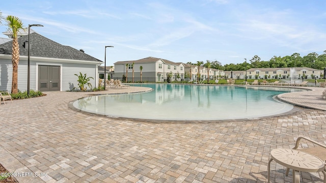 419 Seaport Breeze Rd, Saint Augustine, FL 32095 - pool featuring fence, a residential view, and a patio area