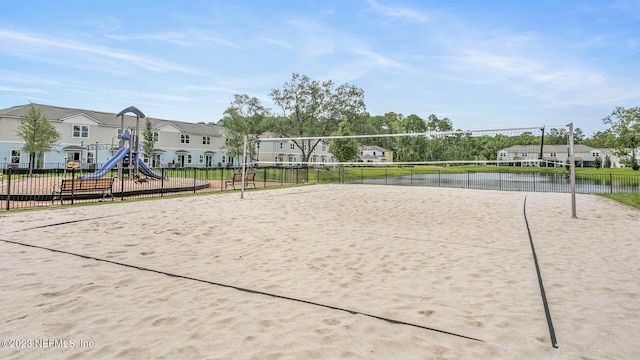 419 Seaport Breeze Rd, Saint Augustine, FL 32095 - view of property's community with a water view, fence, volleyball court, and playground community