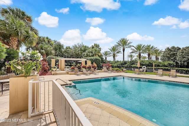 400 E Bay St Unit 1610-1611, Jacksonville, FL 32202 - pool featuring a patio