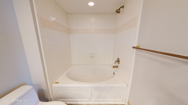 400 E Bay St Unit 1610-1611, Jacksonville, FL 32202 - bathroom featuring toilet and shower / washtub combination