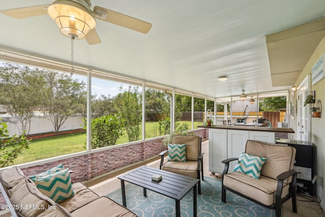 5914 Orchard Pond Dr, Fleming Island, FL 32003 - sunroom featuring a ceiling fan and healthy amount of natural light