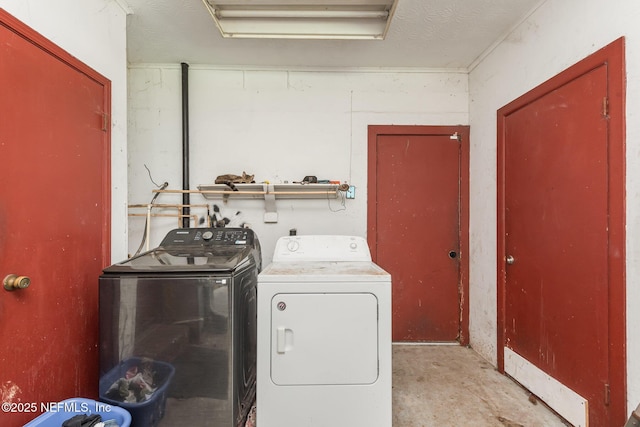 laundry area featuring laundry area and washer and dryer