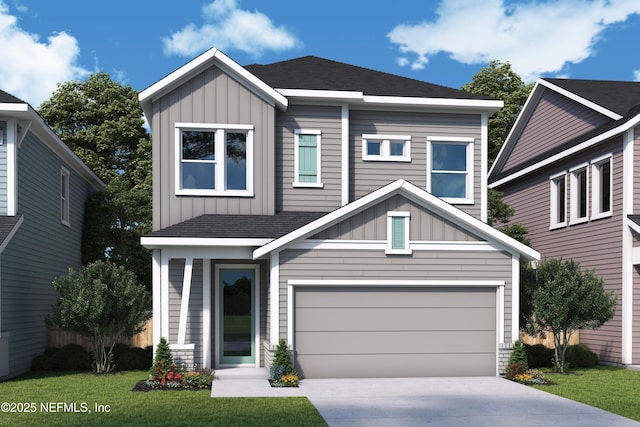 view of front facade with board and batten siding, concrete driveway, a front lawn, and a garage