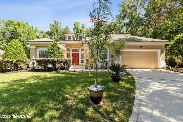 view of front of property featuring a garage, stucco siding, driveway, and a front yard