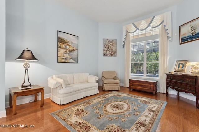 living area with wood finished floors