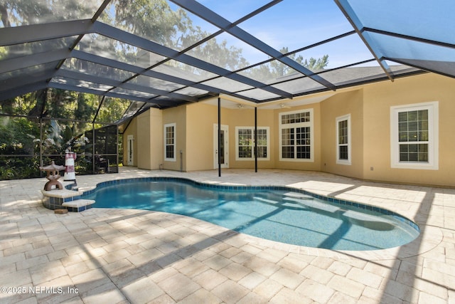 pool featuring a patio area and a lanai