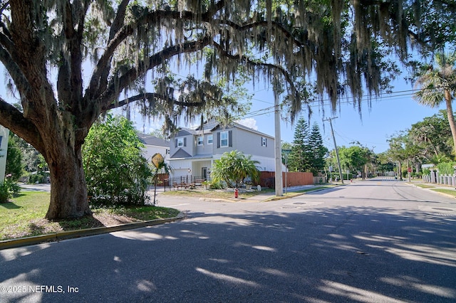 view of street featuring curbs