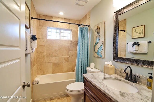 full bathroom with shower / bath combination with curtain, toilet, and vanity