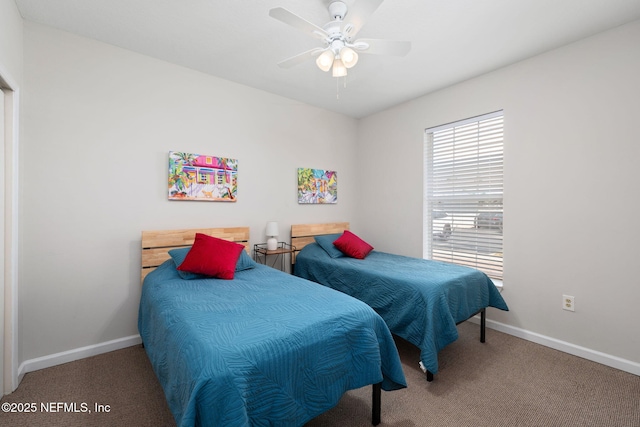 bedroom featuring baseboards, ceiling fan, and carpet