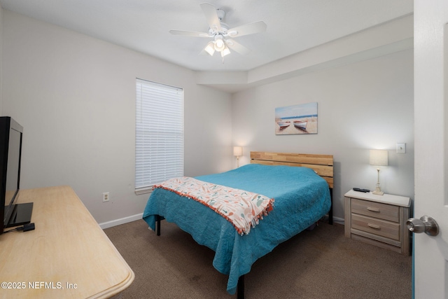 bedroom featuring baseboards, carpet, and a ceiling fan