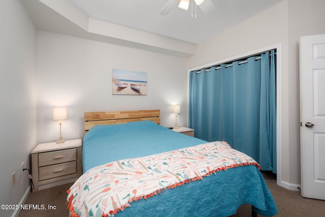 bedroom with baseboards, carpet, and a ceiling fan