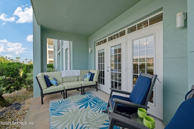 balcony featuring french doors and an outdoor hangout area