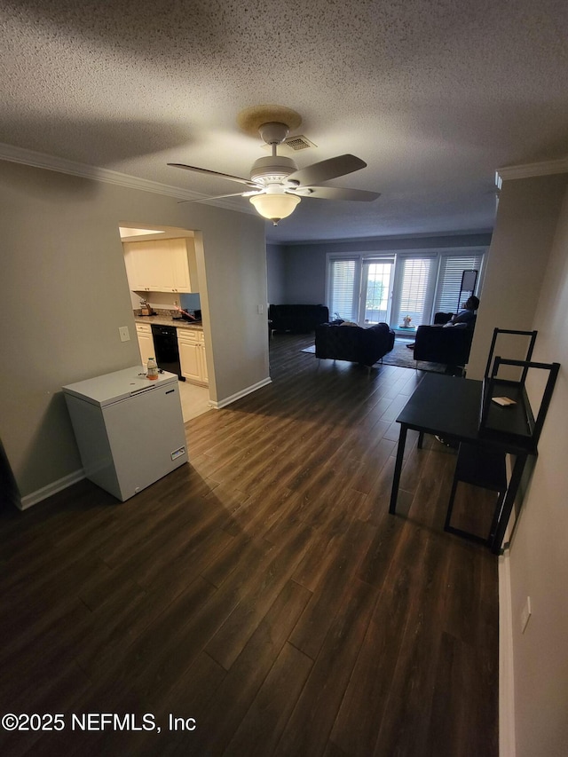 3857 Mission Dr Unit 3, Jacksonville, FL 32217 - living room featuring a textured ceiling, baseboards, ornamental molding, dark wood-type flooring, and ceiling fan
