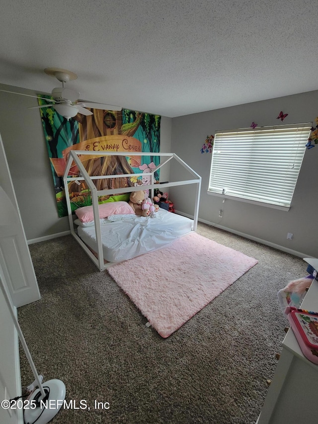 3857 Mission Dr Unit 3, Jacksonville, FL 32217 - bedroom featuring carpet flooring, a textured ceiling, and baseboards