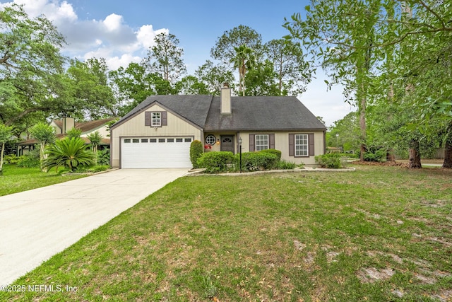 traditional-style house featuring a garage, a chimney, concrete driveway, and a front yard
