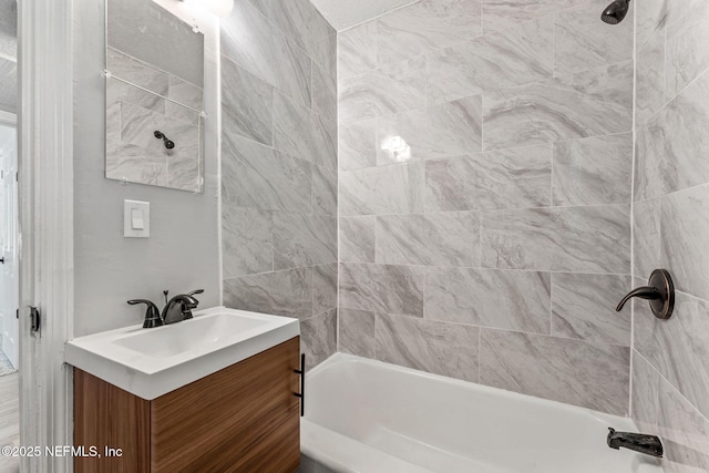 bathroom with vanity and tub / shower combination
