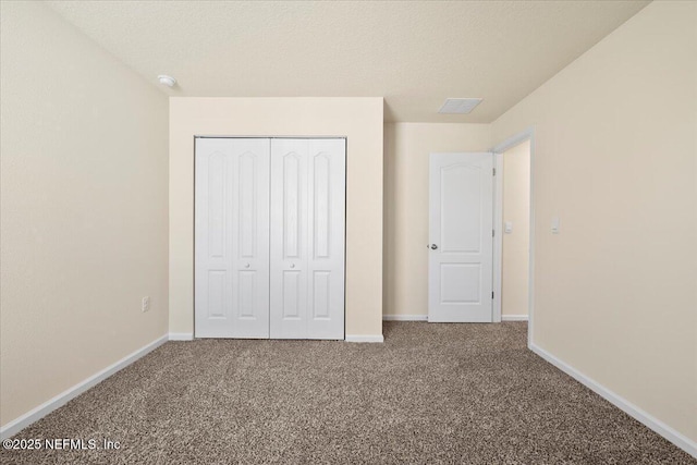 2672 Oak Stream Dr, Green Cove Springs, FL 32043 - unfurnished bedroom featuring baseboards, carpet, and a closet