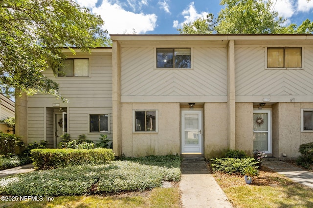 3801 Crown Point Rd Unit 1032, Jacksonville, FL 32257 - townhome / multi-family property with stucco siding