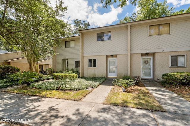 3801 Crown Point Rd Unit 1032, Jacksonville, FL 32257 - townhome / multi-family property with stucco siding