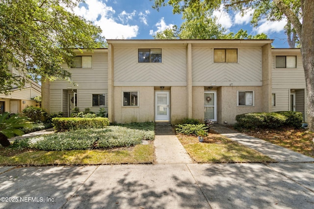 3801 Crown Point Rd Unit 1032, Jacksonville, FL 32257 - townhome / multi-family property featuring stucco siding