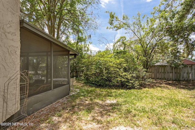 3801 Crown Point Rd Unit 1032, Jacksonville, FL 32257 - view of yard with a sunroom and fence