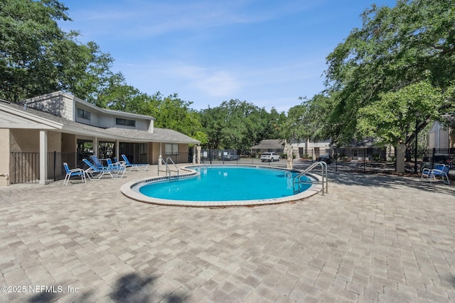 3801 Crown Point Rd Unit 1032, Jacksonville, FL 32257 - community pool featuring a patio area and fence