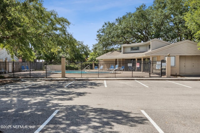 3801 Crown Point Rd Unit 1032, Jacksonville, FL 32257 - exterior space featuring a community pool and fence