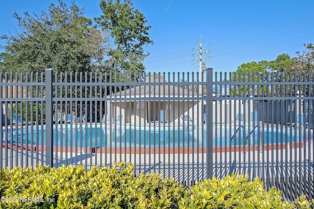 3801 Crown Point Rd Unit 1032, Jacksonville, FL 32257 - view of gate featuring fence and a community pool