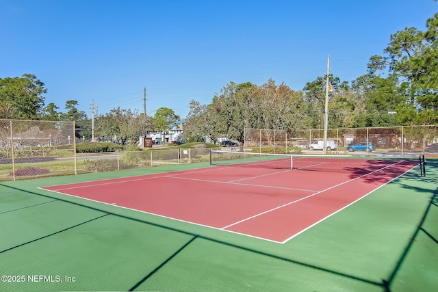 3801 Crown Point Rd Unit 1032, Jacksonville, FL 32257 - view of tennis court with fence and community basketball court