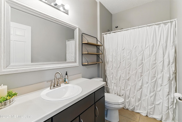 228 Gladstone Ct, Saint Johns, FL 32259 - full bath featuring vanity, tile patterned floors, toilet, curtained shower, and a textured ceiling