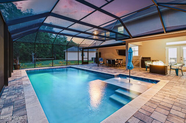 228 Gladstone Ct, Saint Johns, FL 32259 - swimming pool featuring a patio area, outdoor dining area, a hot tub, and a lanai