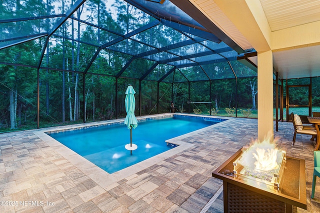 228 Gladstone Ct, Saint Johns, FL 32259 - outdoor pool featuring a patio area, a lanai, and a fire pit
