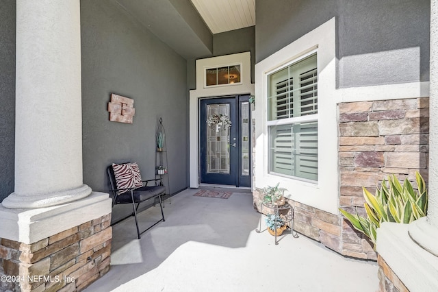 188 Irish Rose Rd, Saint Augustine, FL 32092 - entrance to property featuring a porch and stucco siding