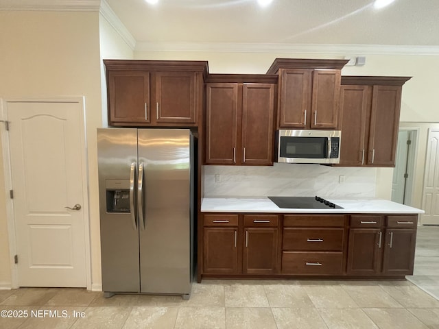 188 Irish Rose Rd, Saint Augustine, FL 32092 - kitchen with backsplash, crown molding, light countertops, and appliances with stainless steel finishes