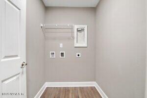 washroom with baseboards, laundry area, electric dryer hookup, and hookup for a washing machine