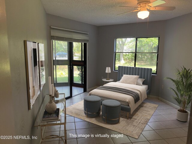 23 Salisbury Ct, Palm Coast, FL 32137 - tiled bedroom featuring baseboards, a ceiling fan, and a textured ceiling