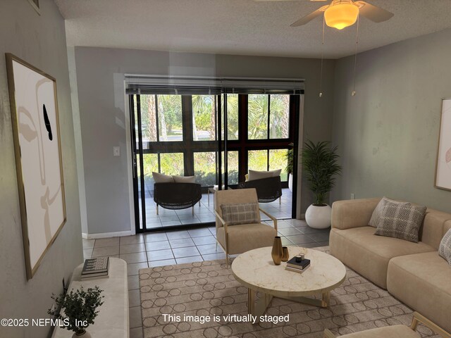 23 Salisbury Ct, Palm Coast, FL 32137 - tiled living room with baseboards, a textured ceiling, ceiling fan, and a healthy amount of sunlight