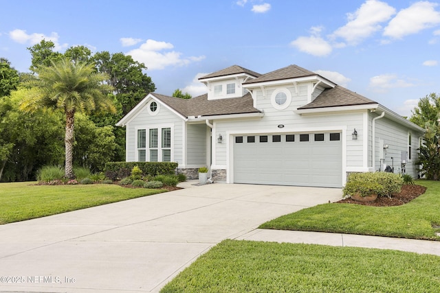 178 Edisto Pl, Saint Johns, FL 32259 - view of front of property featuring driveway, a front yard, roof with shingles, and stone siding