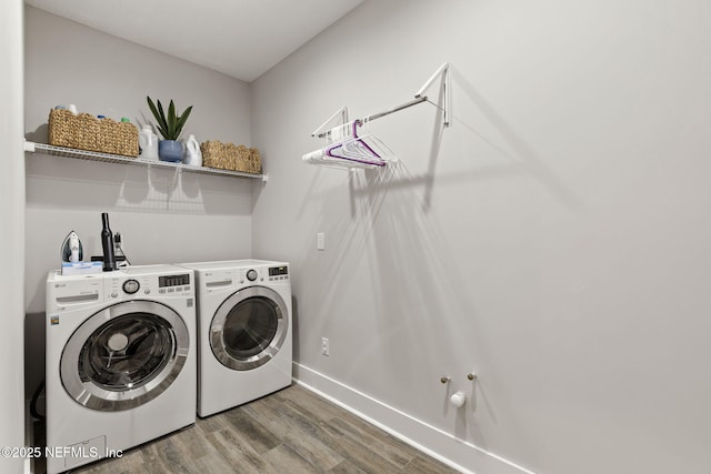 178 Edisto Pl, Saint Johns, FL 32259 - clothes washing area featuring wood finished floors, independent washer and dryer, and baseboards