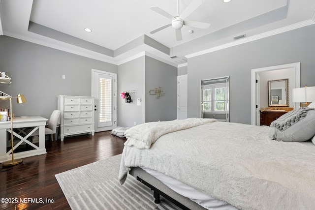 bedroom with a raised ceiling, wood finished floors, ornamental molding, recessed lighting, and ceiling fan