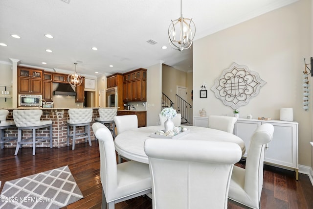 dining area featuring a chandelier, recessed lighting, dark wood-style flooring, stairway, and ornamental molding