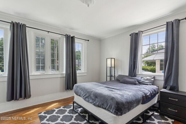 4949 Fremont St, Jacksonville, FL 32210 - bedroom featuring ornamental molding and wood finished floors